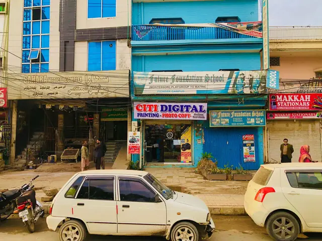 The building on Dr Qadeer Khan Road with the Citi Digital Printing and Photo Copy sign